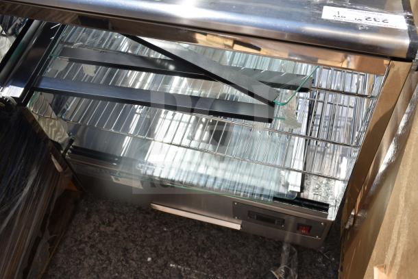 Brand new ServIt 423HDM26SA 26" heated display case, 3 shelves, sliding doors, 120V, visible scratch and dent.