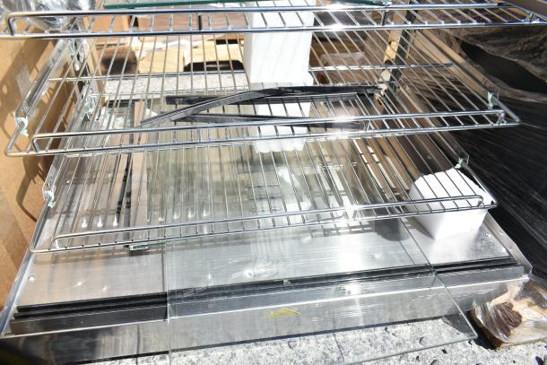 Brand new ServIt 423HDM26SA 26" heated display case, 3 shelves, sliding doors, 120V, minor scratches/dents, countertop unit.