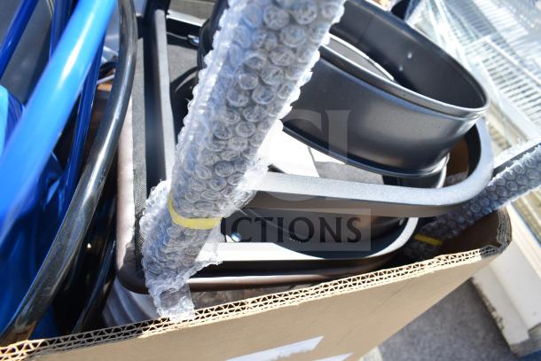 16 brand new ServIt scratch and dent items in box; blue chairs, tables, cake pan visible, model 423HDM26SA.