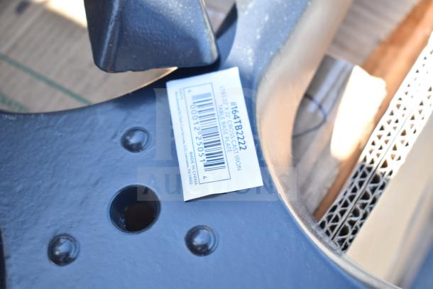 Cast iron table base plate with barcode displaying #164TB222 and "Made in China" label visible.