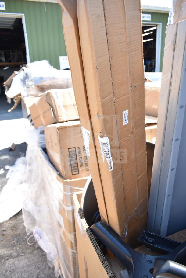 14 new scratch and dent items including ServIt wall corner guard, work table, dolly. Visible shipping labels. Model 423HDM26SA.