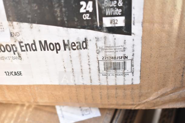 15 new ServIt mop heads with #32 blue and white label. Made in Pakistan for Clark Core Services. Bar code visible.