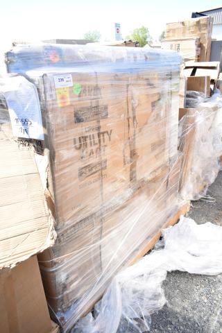 Brand new scratch and dent items including utility cart and sinks on palette. Labeled "Utility Cart 24x36, 1200 lb capacity."