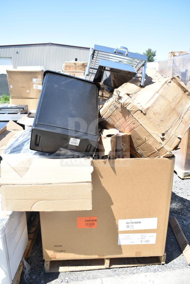 16 new scratch and dent items, including trash cans and ingredient bins, stacked in boxes on pallets. Visible labels.
