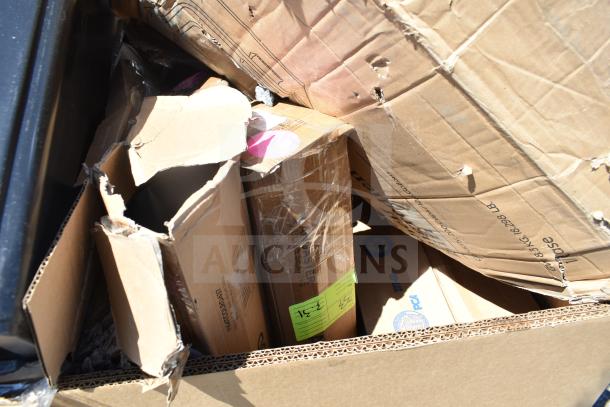 Damaged cardboard boxes containing 16 new scratch-and-dent items, including trash cans and ingredient bins, visible labels.