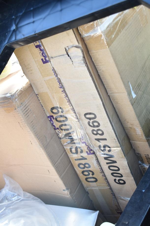 Boxes labeled "FedEx" and "098WS1860 600WS186" in auction lot of 12 mixed items including high chair and shelves.