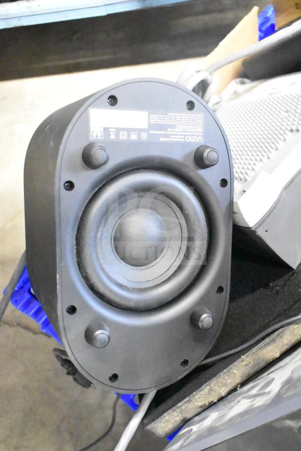 Lot featuring a Vizio SV510XW-0906 subwoofer and Sensormatic ZBSMPROE antenna deactivator, mixed condition.