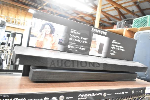 Samsung store display with sound bar, model HW-B53M, featuring dynamic sound and built-in center speaker, in excellent condition.