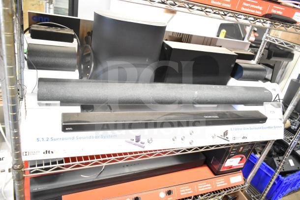 Onn store display with speakers and sound bar, 5.1.2 surround system, ultra-slim design, visible brand markings.