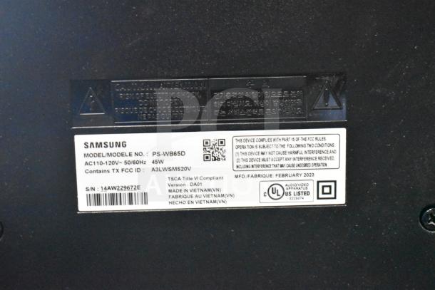Samsung PS-WB65D Wireless Subwoofer label, model info, and serial number. Voltage: AC110-120V, 45W. Made in Vietnam.