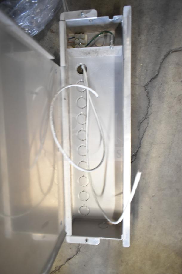 Metallic box with exposed wiring, interior features circular cutouts and a small terminal block, part of 3-item auction lot.