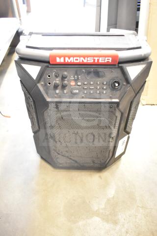 Monster Speaker with control panel, USB port, and rugged design. Features branded logo, worn condition. Perfect for powerful sound.