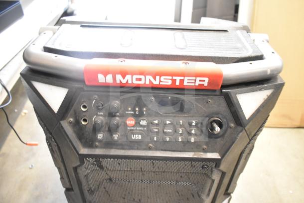 Monster Speaker with control panel, featuring gain and echo knobs, USB input, and AUX port. Good condition, minor wear.