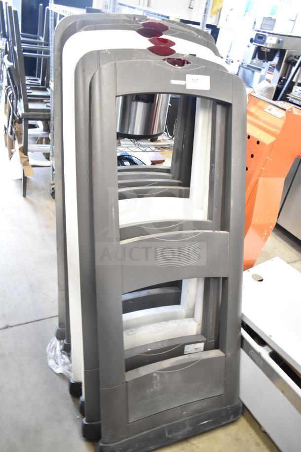 Set of 8 Sensormatic antitheft detectors, gray and white frames, in good condition, available for auction.