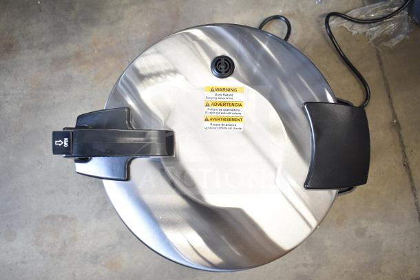 BRAND NEW SCRATCH AND DENT Proctor Silex 37560R 60 Cup Rice Cooker, 120V, with warning labels, top view.