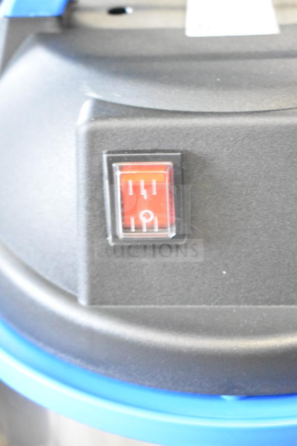 Lavex 944BJ1235G 5 Gallon Stainless Steel Commercial Wet/Dry Vacuum switch detail, appears new with scratch and dent condition.