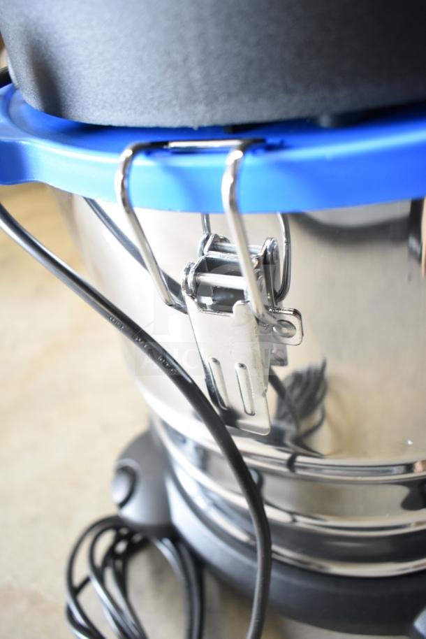 Lavex 944BJ1235G 5 Gallon Stainless Steel Commercial Wet/Dry Vacuum, new condition, blue and black features, power cord visible.