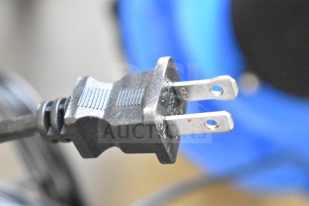 Lavex 944BJ1235G vacuum power plug, 100-120 volts, close-up view.