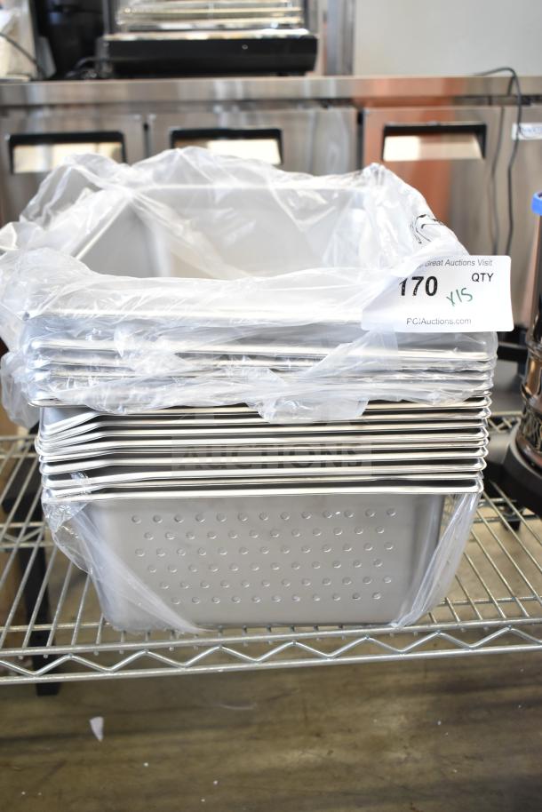 15 brand new drop-in bins, slightly scratched, stacked with protective plastic. Auction tag indicates quantity.