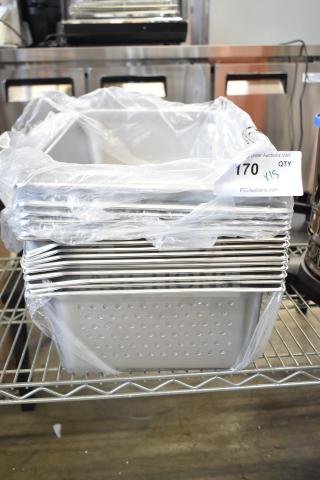 15 brand new drop-in bins, slightly scratched, stacked with protective plastic. Auction tag indicates quantity.