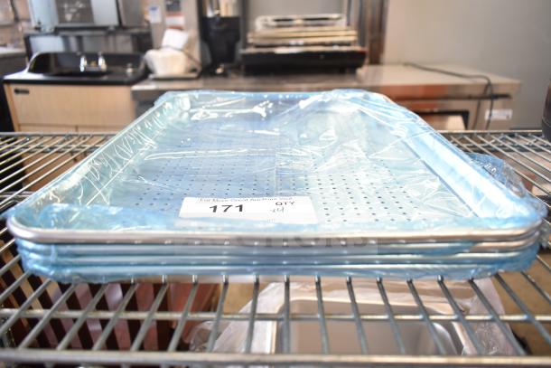 4 new perforated baking pans, wrapped in plastic. Scratch and dent condition. Tag indicates auction quantity 4.