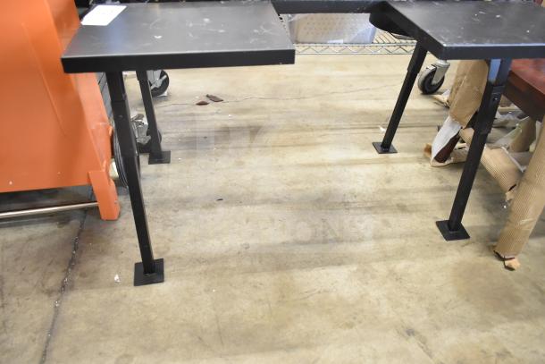 Two-burner propane gas range, brand new with minor scratches and dents. Durable black frame, ideal for outdoor cooking.