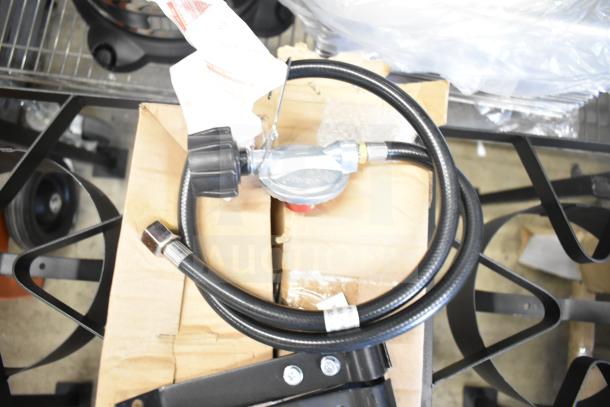 Brand new 2 burner propane gas range with minor scratches. Includes hose and regulator. Ideal for outdoor cooking.