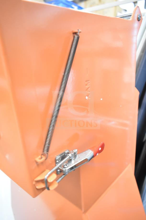 BRAND NEW SCRATCH AND DENT! Fryclone 259OS100 fryer oil shuttle, orange, 70-100 lb capacity, latch detail visible.