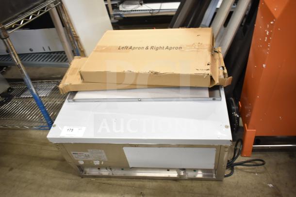 BRAND NEW ServIt 423EST2WSPB Two Pan Electric Steam Table with dents, partially enclosed base, 120V, 1 Phase. Box labeled "Left Apron & Right Apron."