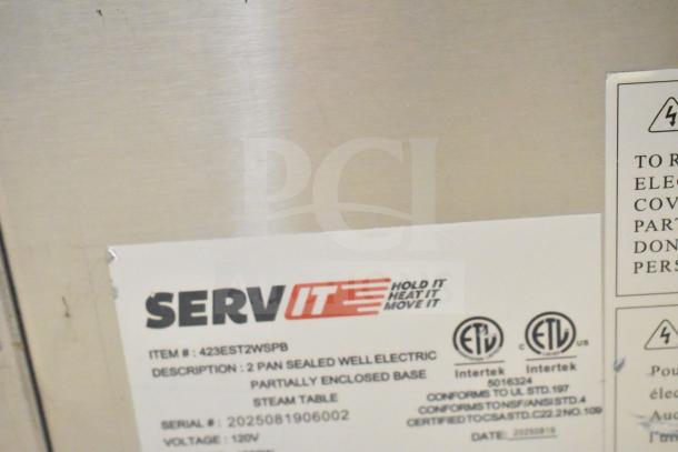 BRAND NEW SCRATCH AND DENT 2025 ServIt 423EST2WSPB Two Pan Sealed Well Electric Steam Table with label showing 120V, 1 Phase.