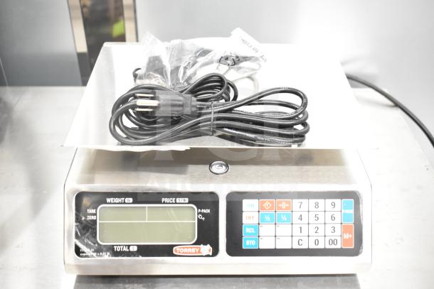 Torrey L-PC-40L 40 lb. digital price computing scale, brand new with minor scratches, includes power cord and control panel.