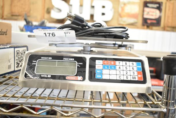 Brand new Torrey L-PC-40L digital price computing scale, 40 lb capacity, with keypad and display, slight scratches visible.
