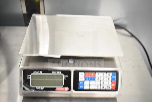 Torrey L-PC-40L 40 lb. digital price computing scale, brand new with minor scratches. Stainless steel surface, LED display.