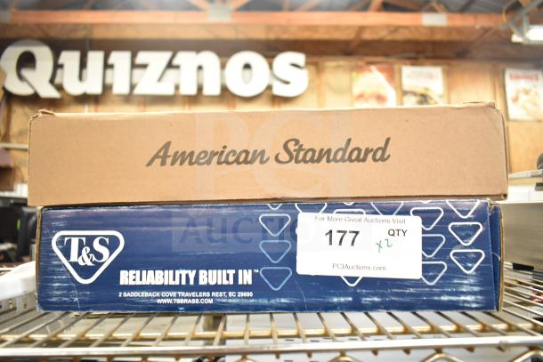 Boxes of a brand new American Standard Monterrey faucet with 8" centers and T&S B-1141-04 faucet, both scratch and dent.