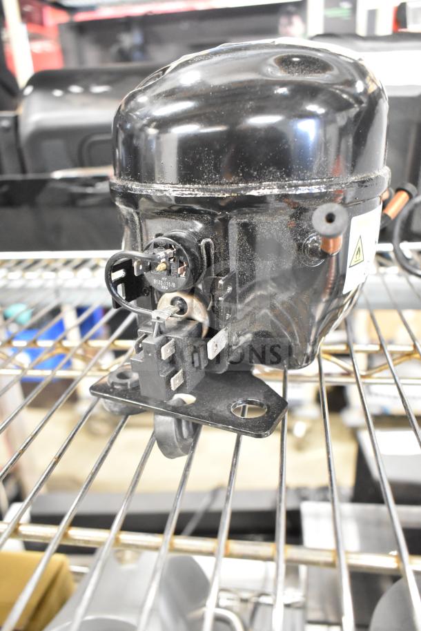 BRAND NEW SCRATCH AND DENT Cubigel NUT70NR Avantco compressor, visible surface marks, model tag details specs.