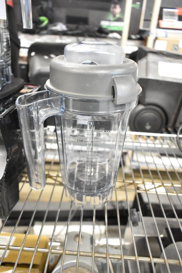 Brand new VitaMix VM0100A blender, 2.3 hp, black, with 48 oz container, scratch and dent condition. Model 062824.