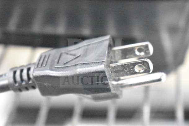 Black power plug of the 2026 VitaMix VM0100A Drink Machine Advance, suitable for 120 volts, 1 phase.