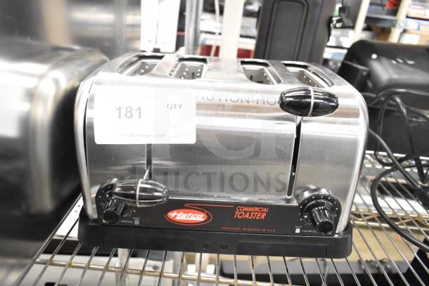 Hatco TPT-120 4 Slice Commercial Toaster, scratch and dent condition, 1 1/4" slots, 120V, 1 phase, auction label visible.