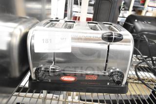 Hatco TPT-120 4 Slice Commercial Toaster, scratch and dent condition, 1 1/4" slots, 120V, 1 phase, auction label visible.