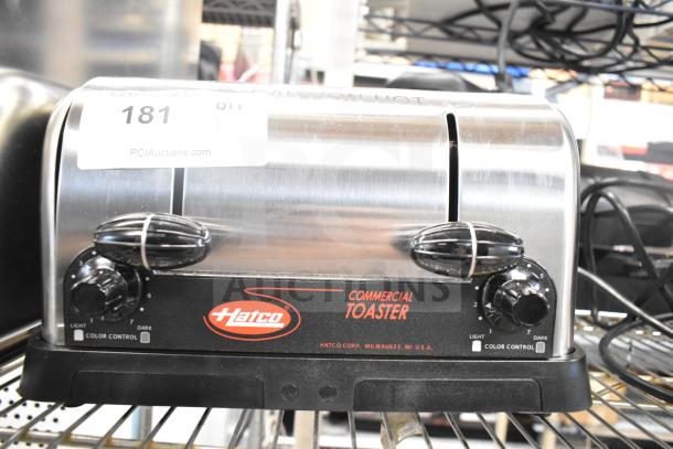 Hatco TPT-120 commercial toaster, 4 slice, 1 1/4" slots, 120V, scratch and dent condition, stainless steel, color control dials.