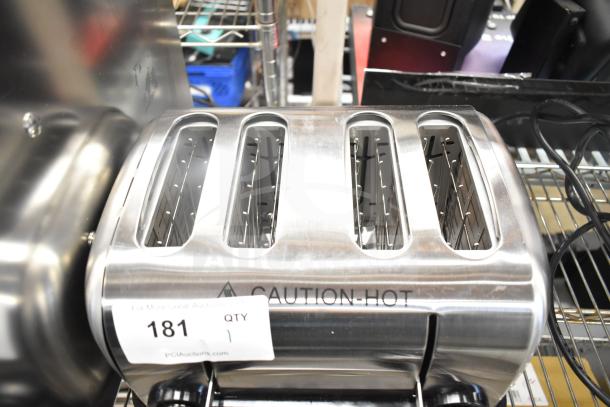 Brand new Hatco TPT-120 commercial toaster with four 1 1/4" slots, 120 volts, caution hot label visible.