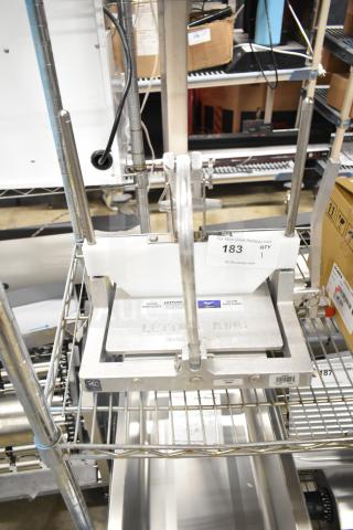 BRAND NEW SCRATCH AND DENT Vollrath 4400N Redco Lettuce King IV Chopper, 1" x 1" cut, no legs, visible caution labels.