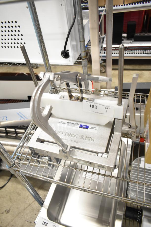 BRAND NEW SCRATCH AND DENT Vollrath 4400N Redco Lettuce King IV, 1" x 1" chopper, no legs, sharp blade caution label visible.