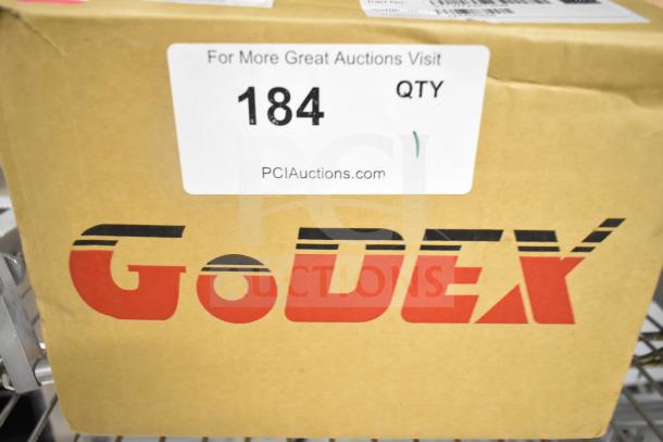 Box of GoDex DT2x Thermal Label Printer, brand new, scratch and dent condition, visible auction label shows "184".