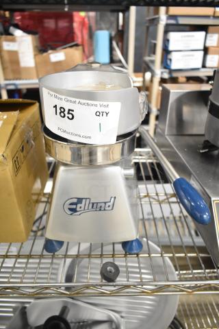 Brand new Edlund EBP-500 hamburger patty press, 5" diameter, countertop model. Scratch and dent condition, visible auction tag.