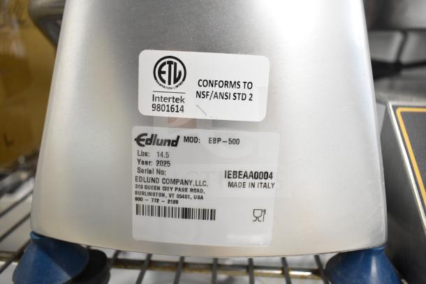 Brand new Edlund EBP-500 countertop hamburger patty press, 5" diameter, scratch and dent condition; model label visible.