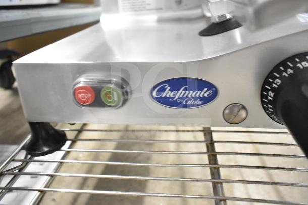 Alt text: Globe Chefmate C12 commercial meat slicer, brand new, with blade sharpener. Features stop/start buttons, 115V, 1 phase.