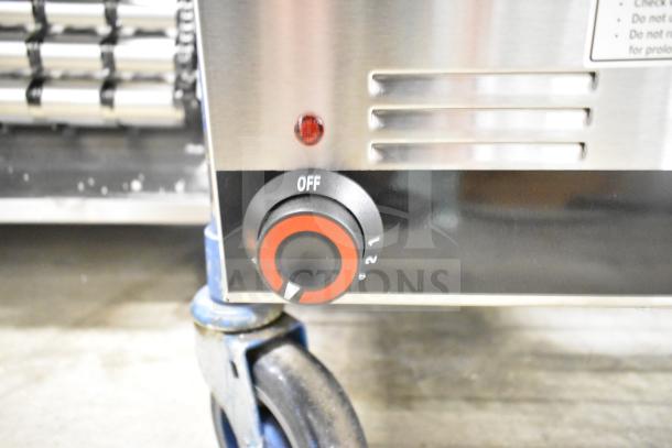 Brand new Galaxy 177GWC50E electric countertop food warmer, 12" x 20", with red temperature dial and indicator light.