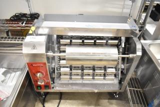 Brand new Avantco 184T18A commercial vertical conveyor bun toaster, 120V, with visible scratch and dent marks.