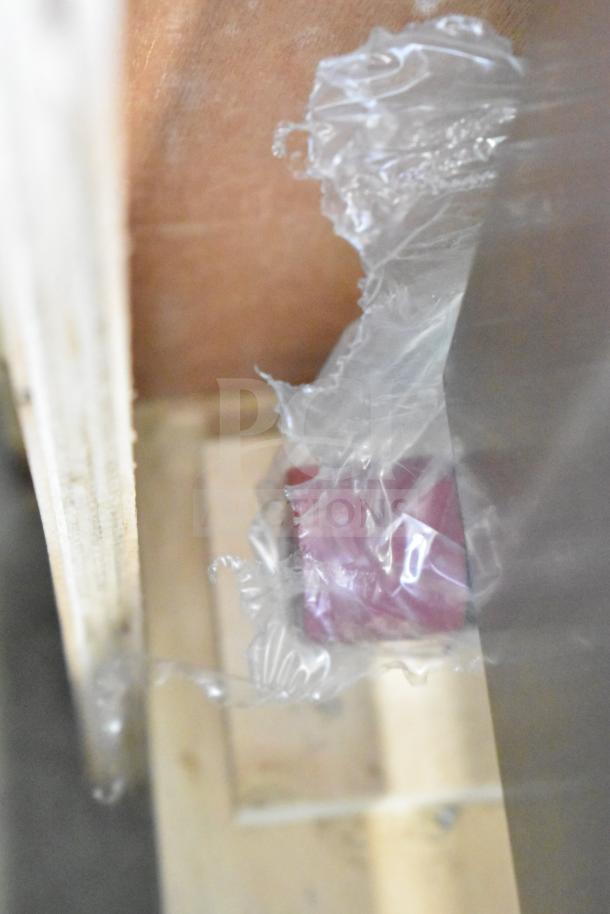 Brand new Cooking Performance Group countertop griddle with thermostatic controls, packaging visible, minor scratches, and dents.